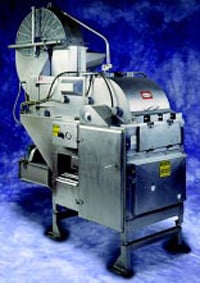 Brown model 720 Premium Citrus Juice Extractor features an integrated cleaning system that uses rotary nozzles for ease of cleaning. 