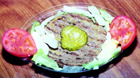 Beef on a leaf? Some restaurants are serving bunless hamburgers on a bed of lettuce as part of their low-carbohydrate menu.