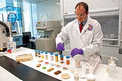 FDA chemist Patrick Gray prepares rice-based food samples for analysis.
