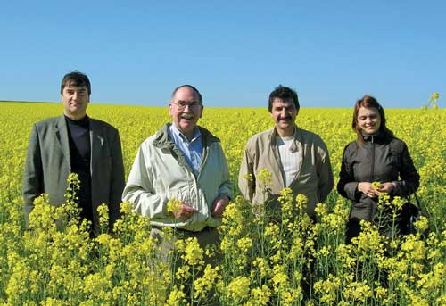 Peter Clark (second from left) in a mustard field in Moldova.