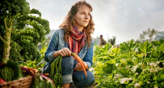 Woman in vegetable field