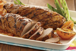 Ingredients like sweet tea marinade, ginger, and soy sauce enhance grilled foods like pork tenderloin.