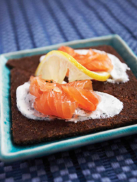 Gravlax—salmon that is cold-cured with sugar, salt, and fresh dill—is served not only as an appetizer but as a topping for the Danish open-faced sandwiches called smørrebrød.