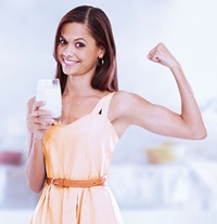 Woman drinking protein drink