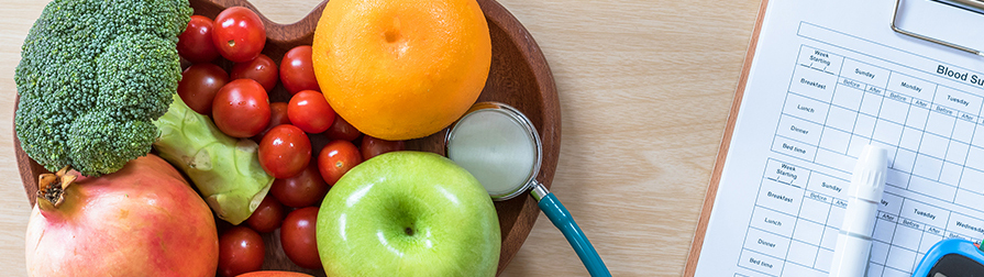 Nutrition a plate of fruits and veggies with stethoscope and clipboard
