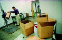Package engineer performs a test at UPS’s Package Lab in Addison, Ill.