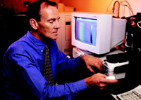 A U.S. Dept. of Agriculture chemist prepares a sample of corn fiber gum for analysis.