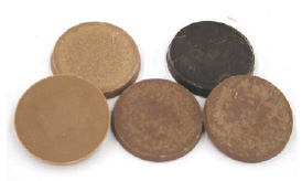 Stages of normal (fat) bloom on chocolate discs stored incorrectly or for long periods.