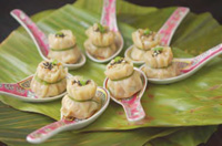 Flavors traditionally associated with beverages are splashing over their boundaries into food products. These flavors can help provide novelty and culinary excitement. Shown here, for example, are Asian-inspired dumplings served with a tea dipping sauce.