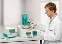 Metrohm analyst adds a sample to the recently introduced 885 Compact Oven Sample Changer for KF titration for moisture determination. The sample is heated in an oven, and a carrier gas transfers the released water to the titration cell, where it is then determined by Karl Fischer (KF) titration. Because only the water enters the KF cell and the sample itself does not come into contact with the KF reagent, unwanted side reactions and matrix effects are eliminated.