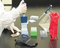 Lysate from enriched samples is added to reagent tubes, which are subsequently loaded into the 3M Molecular Detection System for isothermal DNA amplification and bioluminescence detection.