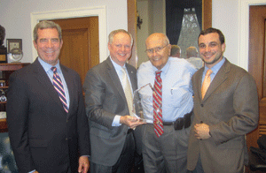 On hand for the presentation of the 2012 Congressional Support for Science Award to Rep. John Dingell (third from left) were (from left) attorney John Bode; IFT staff member Will Fisher; and attorney Anthony Pavel