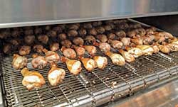 Chicken roasting in a Unitherm spiral oven.