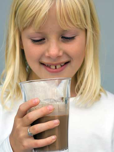 Girl drinking chocolate milk