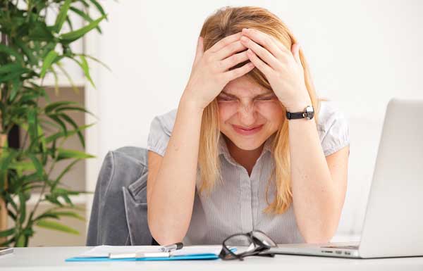 Stressed woman at work