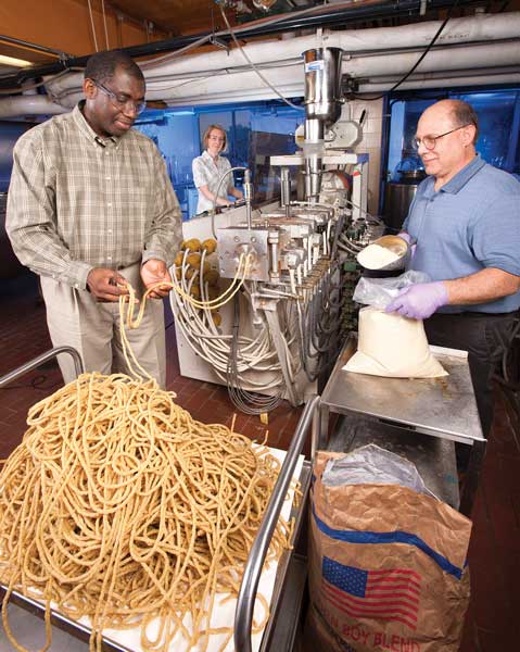 Charles Onwulata (left) with Eric Tilman and Audrey Thomas-Gahring.