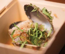 Pepper jelly and coconut braised clam dish.
