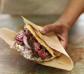 Sweet Plantain and Steak Arepas with Tzatziki Hot Sauce. 