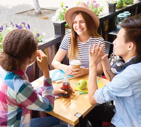 Young people eating lunch.