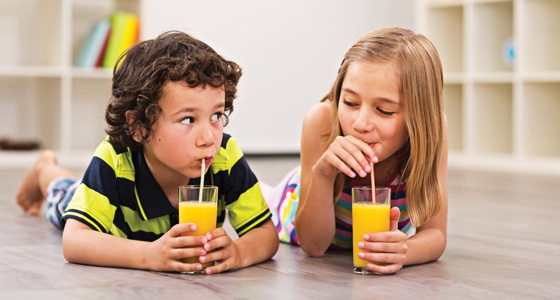 Children drinking juice