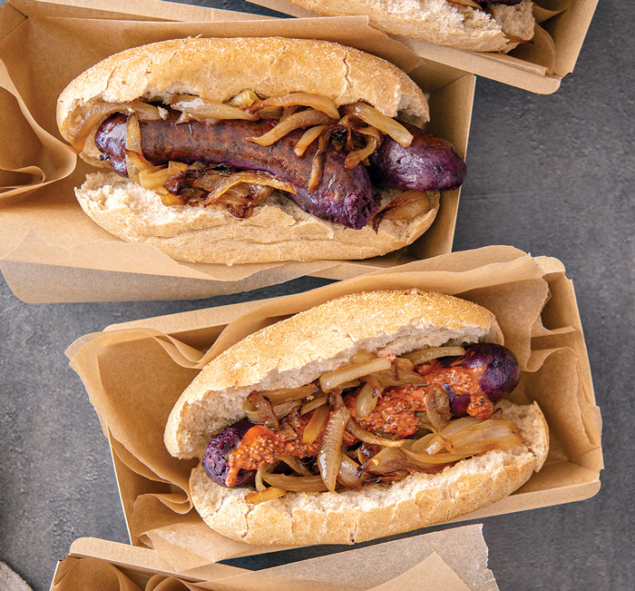Plant-based, purple-hued sausages feature carrot mustard. Photo courtesy of GNT 