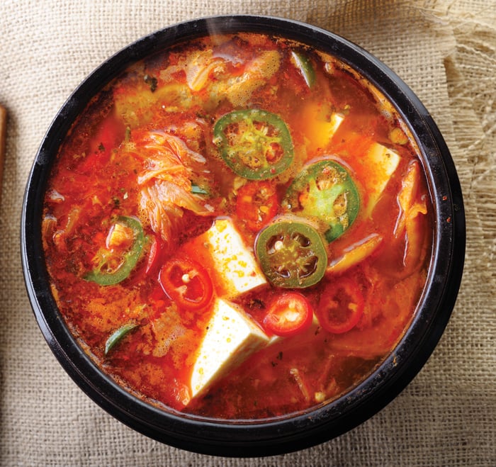 A bowl of red Kimchi soup