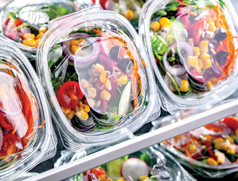 Boxes with pre-packaged vegetable salads