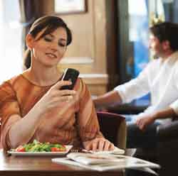 Woman checking smart phone