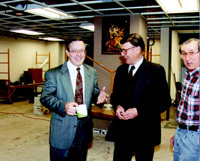 Weber discusses remodeling progress with 1987–91 IFT Executive Director Howard W. Mattson (center) and Director of Publications John B. Klis during the expansion of IFT’s headquarters office at 221 N. LaSalle St. in Chicago in March 1992.