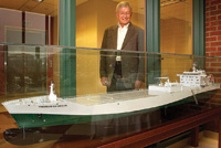 Philip Nelson looks at an 8-ft-long model of the Premium do Brasil cargo ship, a gift from Citrosuco, a Brazilian company that utilizes Nelson’s aseptic bulk storage technology. The actual ship delivers orange juice from Brazil to the U.S. in 16 bulk aseptic storage tanks with an overall capacity of nearly 8 million gal.