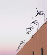 Wind turbines generate a renewable source of energy at Kettle Foods’ new potato chip factory in Beloit, Wis.