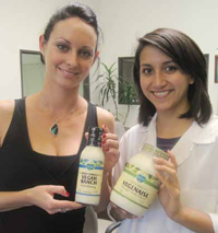 Sheena Bliss (left) and Jessica Ruiz show off Follow Your Heart Vegan Ranch Salad Dressing and Vegenaise.