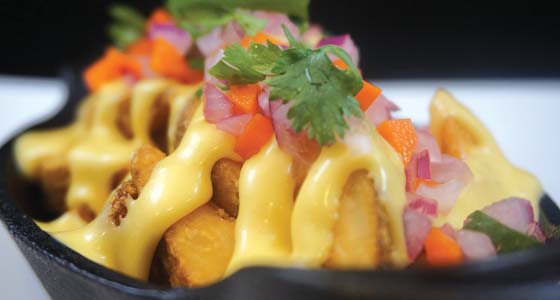 Ingredients inspired by Latin American cuisine were used in Peruvian Cheese Fries