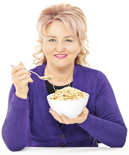 Woman eating cereal