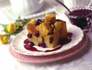 Cake with blueberries and blueberry sauce