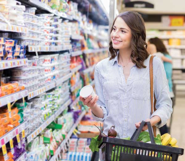 Woman shopping for dairy products