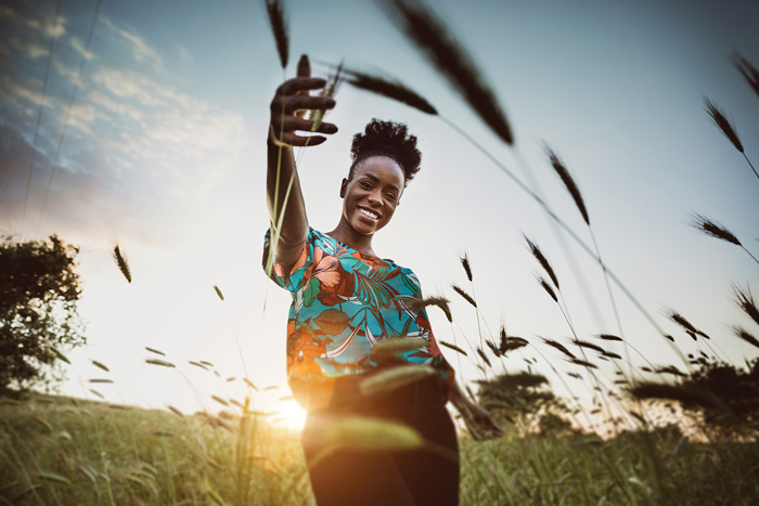 woman in field of grain