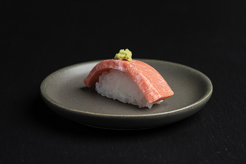 BlueNalu Bluefin Tuna on rice on a plate