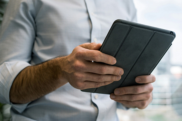 Man using a tablet.