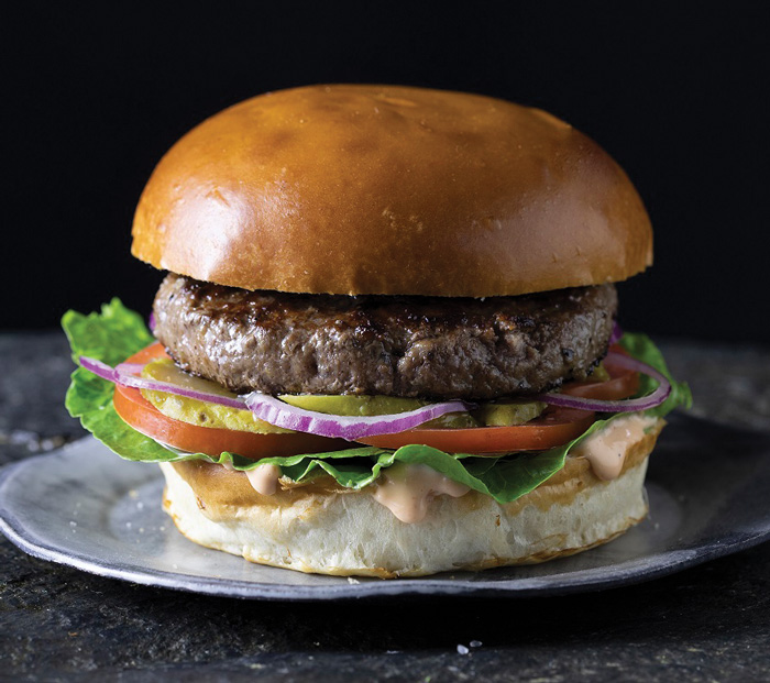 Burger using Mush Foods 50CUT mycelium protein ingredient solution.