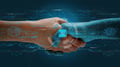 Humans shake hands with AI to show partnership. Machine learning to enable and work together to achieve greater innovation and success.