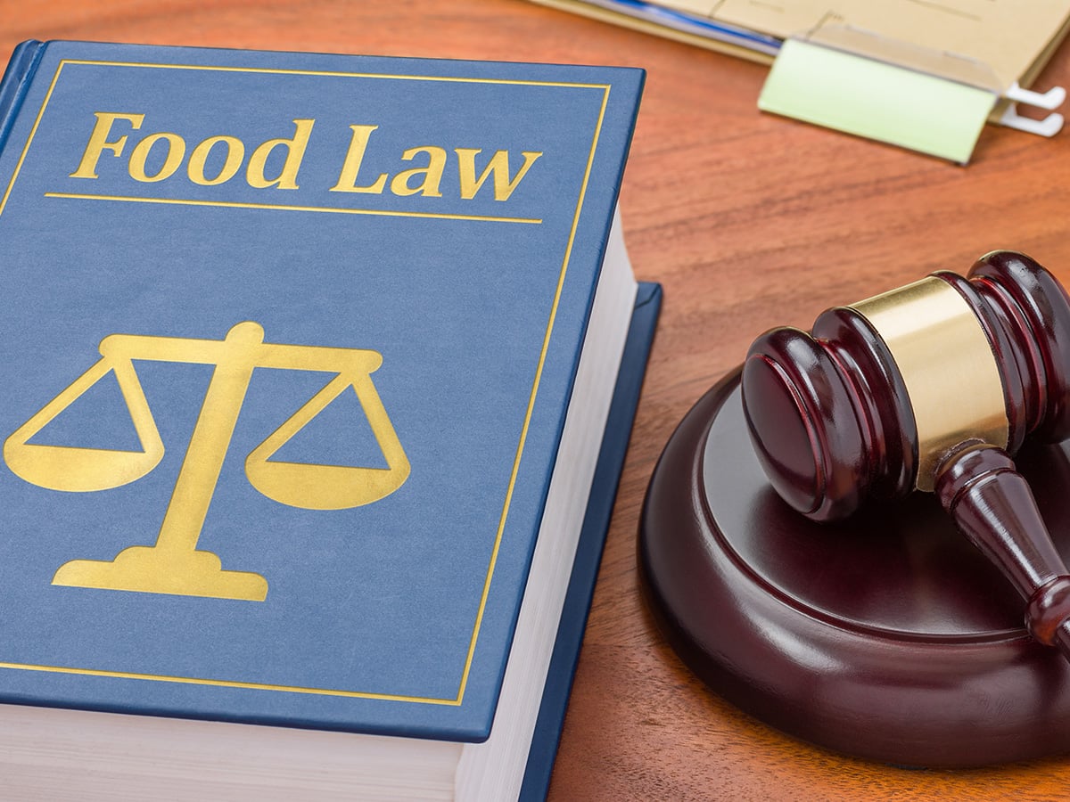 Food Law book and a gavel on a desk