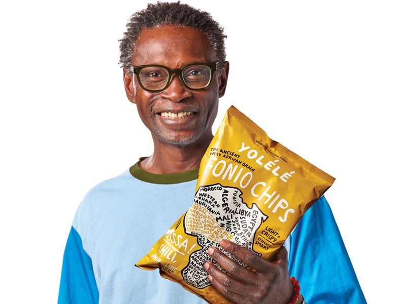 Yolélé Foods cofounder Pierre Thiam shows off a bag of Yolélé Fonio Chips.