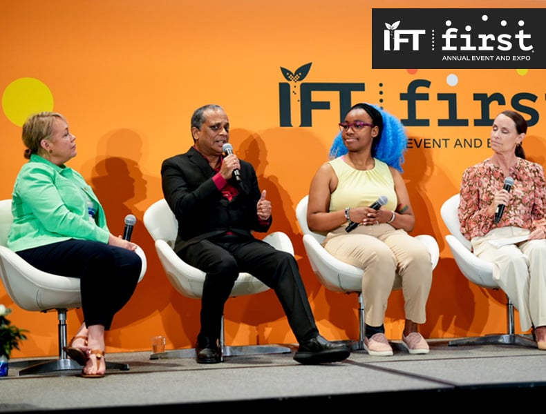 Panelists in a Business FIRST session