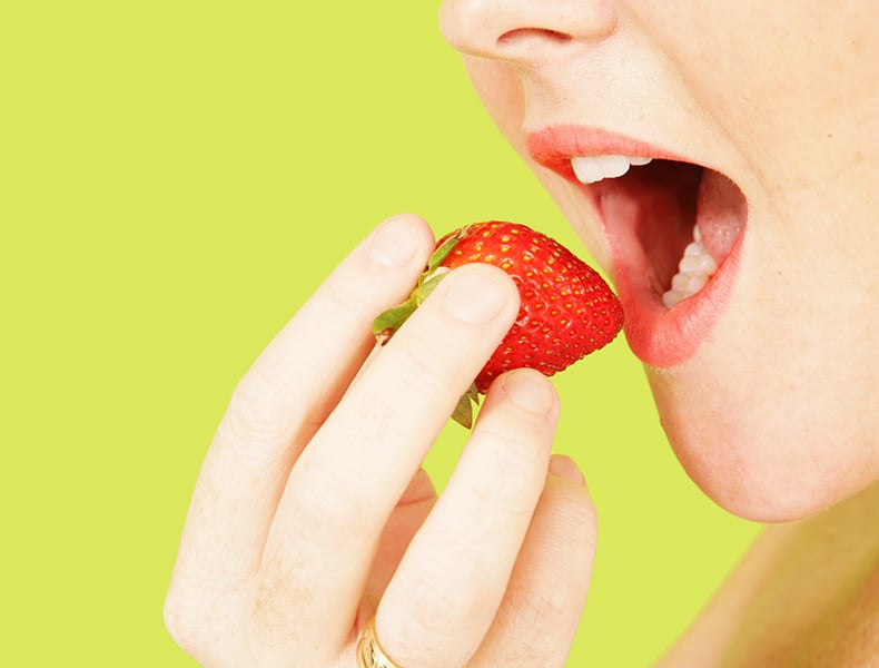 eating a strawberry