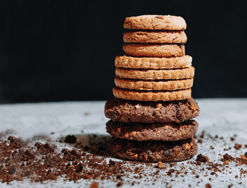 Close up stack of cookies and crumbs
