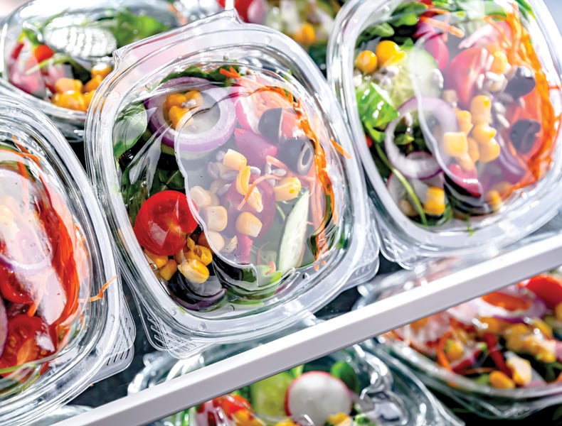 Boxes with pre-packaged vegetable salads