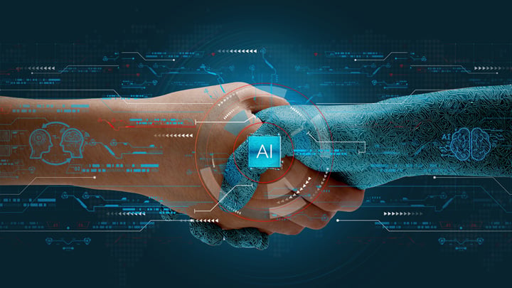 Humans shake hands with AI to show partnership. Machine learning to enable and work together to achieve greater innovation and success.