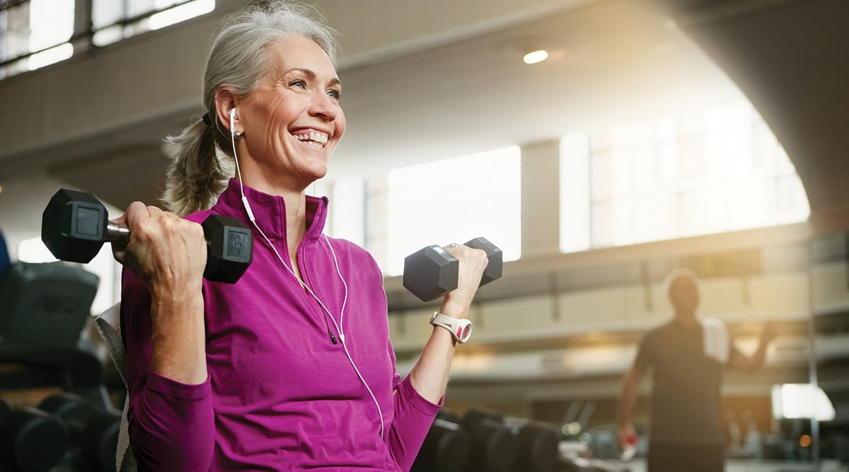 Women exercising in pink shirt