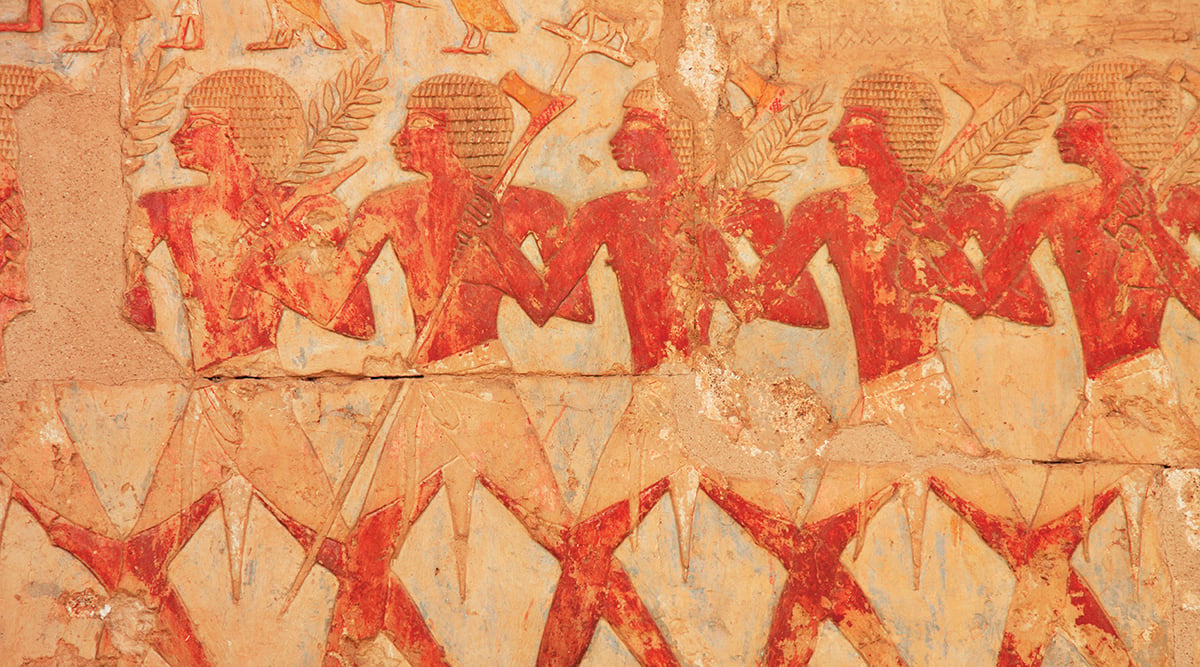 Hieroglyphics depicting farmers during harvest
